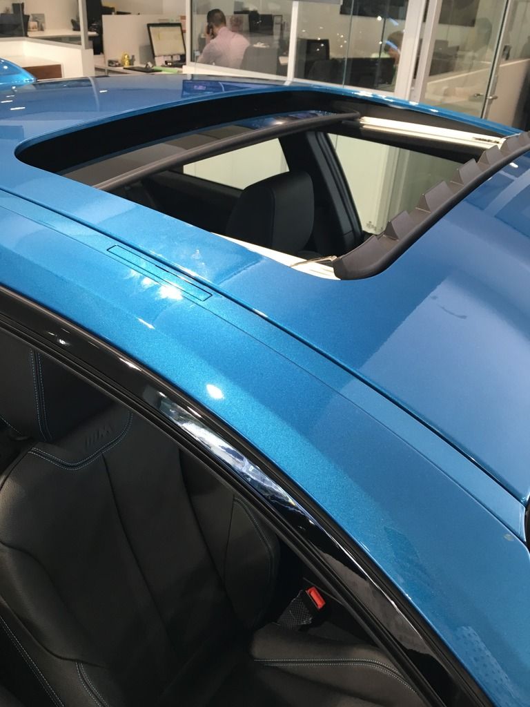 M2 with sunroof pics please.